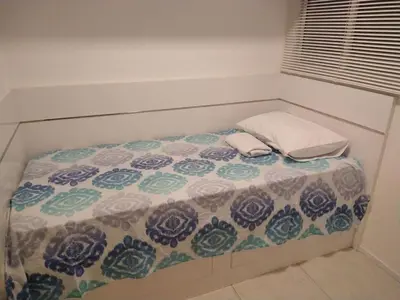 Uma cama ou camas num quarto em Porto das Dunas a 300m do Beach Park Paraíso