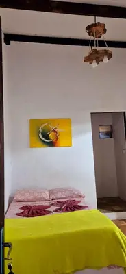 Uma cama ou camas num quarto em Condomínio em Canoa Quebrada