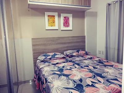 Uma cama ou camas num quarto em Temporada VGFUN CONFORT UNICO