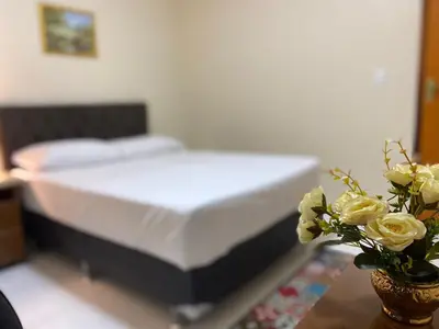Uma cama ou camas num quarto em Bertolini Hotel