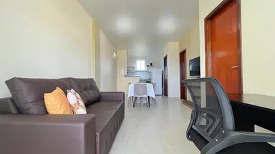 Uma área de estar em BELÍSSIMO 2 SUÍTES- PRÓXIMO DA PRAIA I SAN GIACOMO