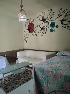Uma cama ou camas num quarto em Solar da Praia Kitesurf House