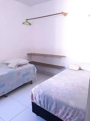 Uma cama ou camas num quarto em Cantinho arretado da Peste - Apartamento