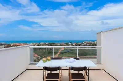 Uma varanda ou terraço em Beach Townhouses #C2 - Apartamento por Carpediem