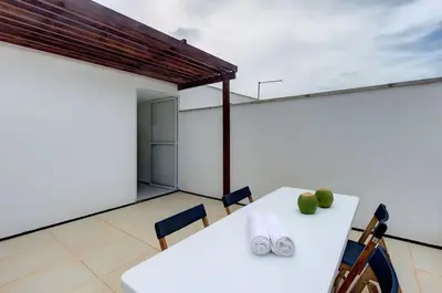 Uma varanda ou terraço em Beach Townhouses #C2 - Apartamento por Carpediem