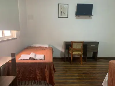 Uma televisão e/ou sistema de entretenimento em Casa do Sol Fortaleza