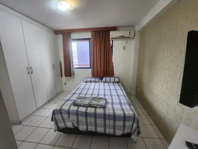 Uma cama ou camas num quarto em Condomínio Costa do Sol