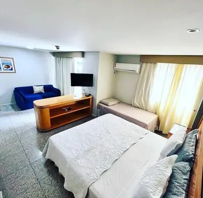 Uma cama ou camas num quarto em Apê Beira Mar Meireles Com café da manhã