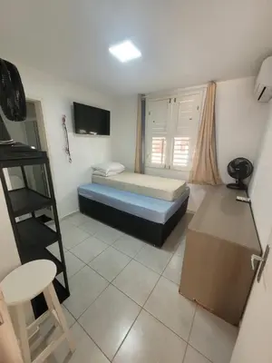 Uma cama ou camas num quarto em MB07101 - Morro Branco - Térreo - 3 quartos - 2 suites - churrasqueira