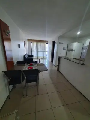 A cozinha ou kitchenette de Praia Mansa Suíte Hotel