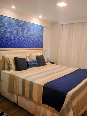 Uma cama ou camas num quarto em Top Flat Fortaleza