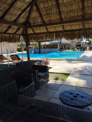 A piscina em ou perto de CUMBUCO - Eco Paradise - AP 112 - Rezende temporada