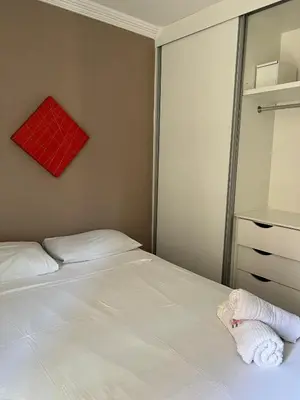 Uma cama ou camas num quarto em Apartament Beach Fortaleza