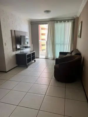 Uma televisão e/ou sistema de entretenimento em Apartament Beach Fortaleza