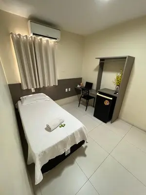 Uma cama ou camas num quarto em SD Plaza Hotel