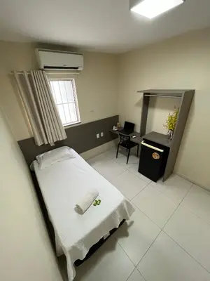 Uma cama ou camas num quarto em SD Plaza Hotel