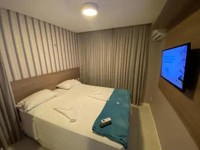 Uma cama ou camas num quarto em Mandara Lanai