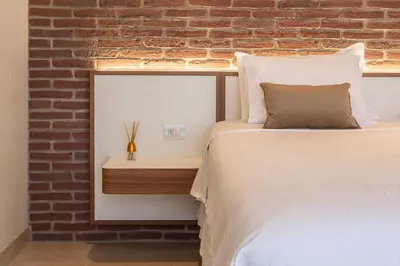Uma cama ou camas num quarto em VM Hotel Cumbuco