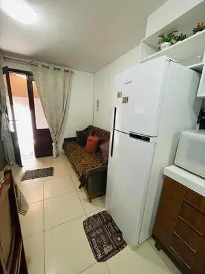 A cozinha ou kitchenette de Aluguel Apto. Triplex Guaramiranga.
