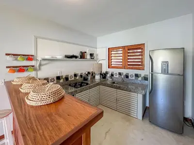 A cozinha ou kitchenette de Casa super charmosa com piscina em Icaraizinho!