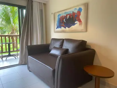 Uma área de estar em Vg Sun Cumbuco C5 106