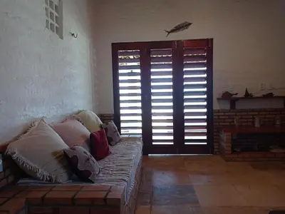 Uma área de estar em Casa dos Ximenes - Beira Mar da Taíba - Ótima localização