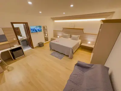 Uma cama ou camas num quarto em Villa Paririö