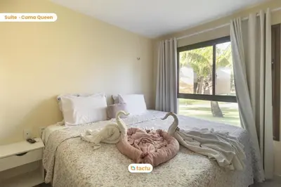 Uma cama ou camas num quarto em Térreo completo e gigante VG Sun Cumbuco por Tactu