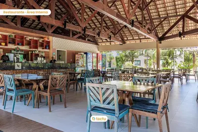 Um restaurante ou outro lugar para comer em Apartamento gigante VG Sun Cumbuco por Tactu