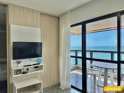 Uma televisão e/ou sistema de entretenimento em Apartamento na Beira Mar de Fortaleza