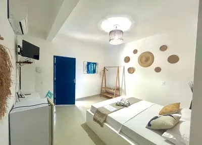 Uma cama ou camas num quarto em Casa boa vida