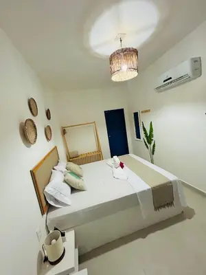 Uma cama ou camas num quarto em Casa boa vida