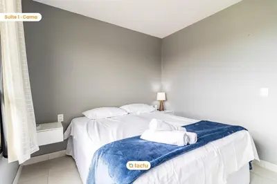 Uma cama ou camas num quarto em Apto com linda varanda no VG Sun Cumbuco por Tactu