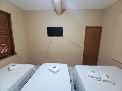 Uma cama ou camas num quarto em Iracema Praia Flats