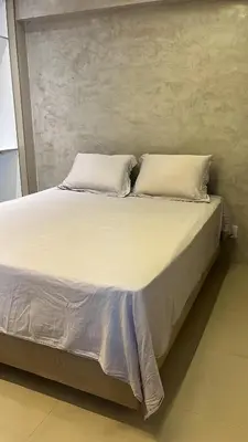 Uma cama ou camas num quarto em Lindo apartamento a poucos passos da praia. Vem Fortalezear!