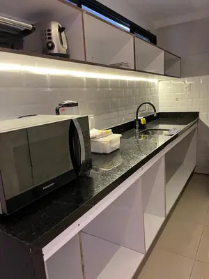 A cozinha ou kitchenette de Lindo apartamento a poucos passos da praia. Vem Fortalezear!