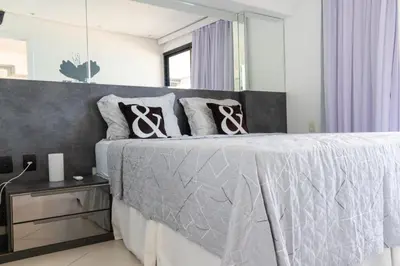 Uma cama ou camas num quarto em Landscape VIP Fortaleza