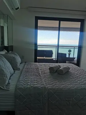 Uma cama ou camas num quarto em Landscape VIP Fortaleza