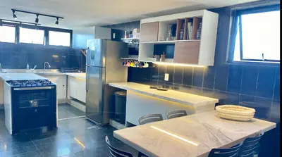 A cozinha ou kitchenette de Apartamento Oceano Praia Fortaleza