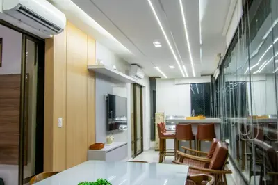 Uma área de estar em Mandara Lanai Apartamento Bangalô