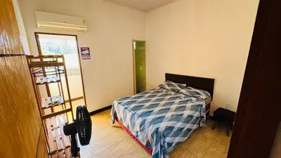 Uma cama ou camas num quarto em Localize casa na praia