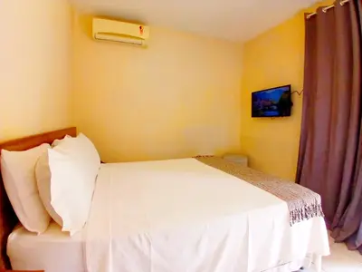 Uma cama ou camas num quarto em Panorama Cumbuco