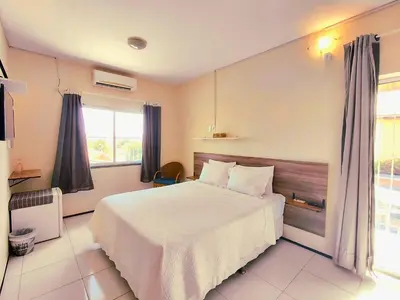 Uma cama ou camas num quarto em Panorama Cumbuco