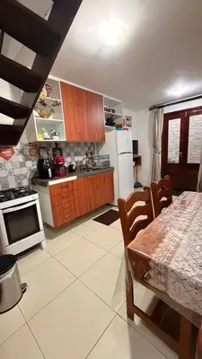 A cozinha ou kitchenette de TRIPLEX SOLAR CASA BRANCA