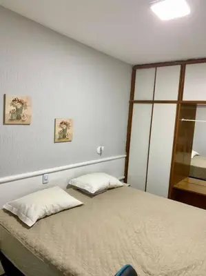 Uma cama ou camas num quarto em Flat Meireles Vista Mar