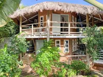 Um jardim no exterior de Casa Zulu - Vila Umoya
