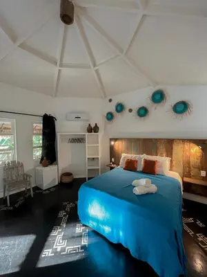 Uma cama ou camas num quarto em Casa Zulu - Vila Umoya