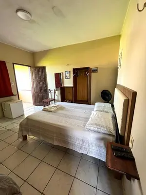 Uma cama ou camas num quarto em Bela Vista