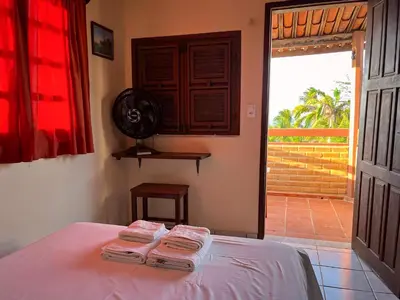 Uma cama ou camas num quarto em Bela Vista