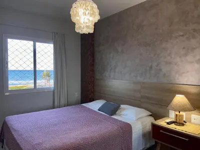 Uma cama ou camas num quarto em AllMar Flats - Vg Fun - Frente mar